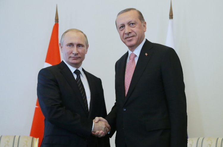 Путин на встрече с Эрдоганом пошутил о главе турецкой разведслужбы