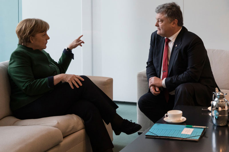 Меркель поведала Путину о планах поговорить с Порошенко — Ушаков